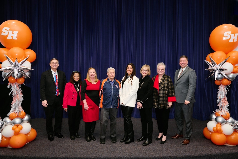 From left: Provost Michael T. Stephenson, Dean Shar Self, Dawn Wesneski, Robert Hutson, Lauryn Hutson, Sylvia Hutson, University President Alisa White and Matthew Bethea.