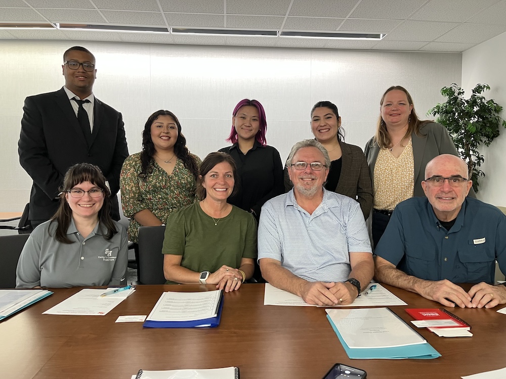 Members of the CHSS skills challenge&rsquo;s most outstanding team pose with the Good Shepherd Mission's board of directors. 